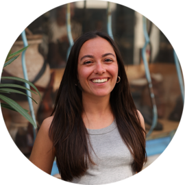 Portrait of a smiling woman. Perfect guide for Amsterdam trips.